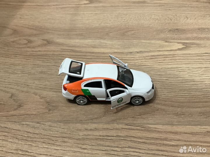 Автомобиль каршеринг Skoda Rapid игрушка