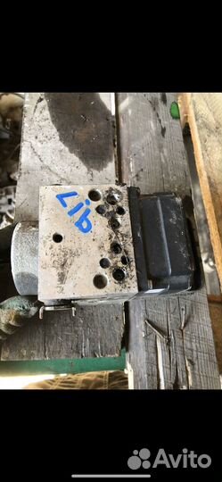 Блок abs nissan liberty