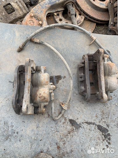 Суппорт тормозной передний subaru legacy outback