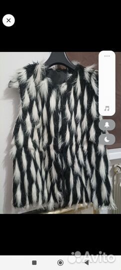 Жилеты теплые женские