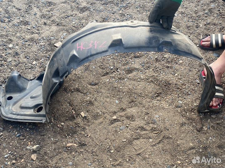 Подкрылок передний левый HC34