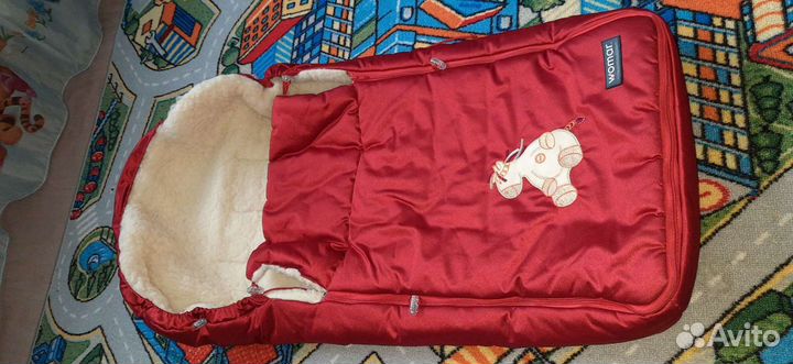 Меховой конверт из овчины в коляску