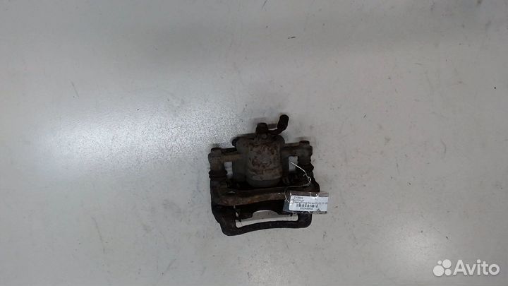 Суппорт правый задний SsangYong Korando 2010