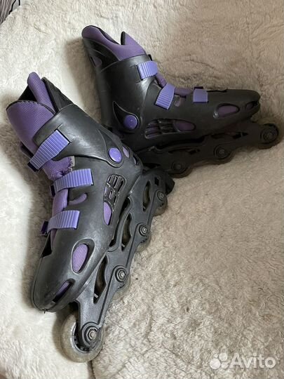 Роликовые коньки