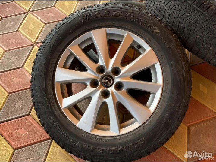 Bridgestone Blizzak DM-V1 225/65 R17 102R