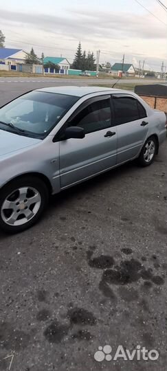 Mitsubishi Lancer 1.3 МТ, 2004, 100 000 км