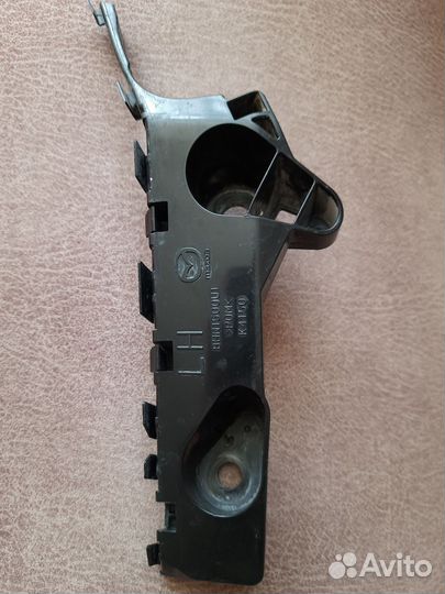 Крепление бампера переднее левое Мазда 3 BM BN