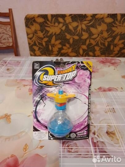 Вертушка юла с запуском, свет. Вертушка-пистолет