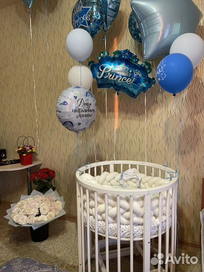 Детская кроватка с маятником