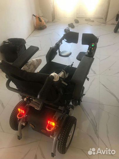 Продам электрический инвалидную коляску