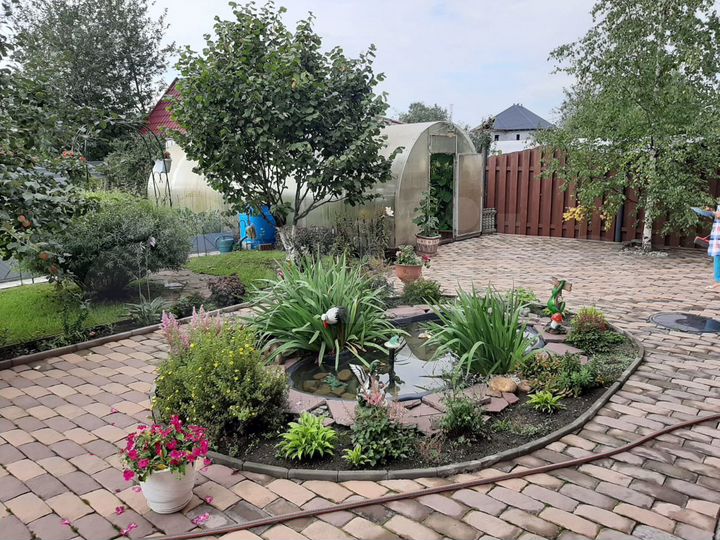 Коттедж 213 м² на участке 10 сот.