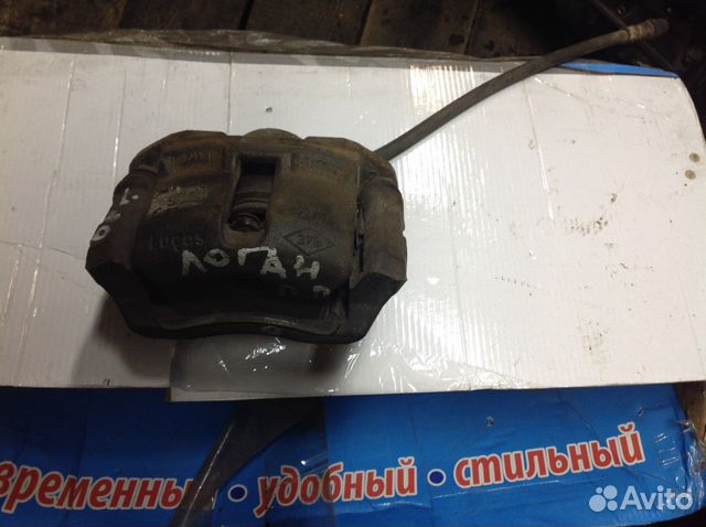 Суппорт тормозной передний правый Рено Логан