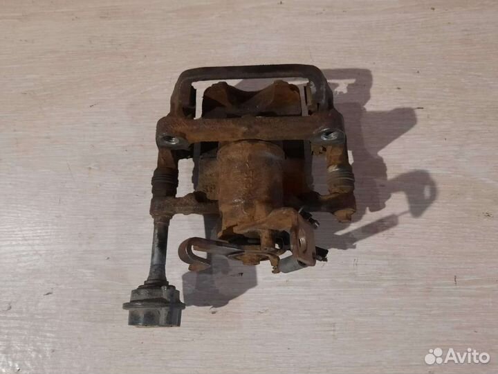 Суппорт задний правый Opel Astra J Astra JTS