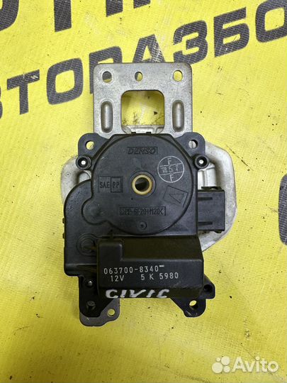 Моторчик заслонки отопителя Honda Civic