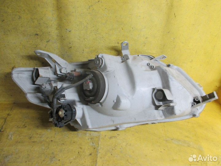 Фара Toyota Corolla fielder NZE141G (Левое)