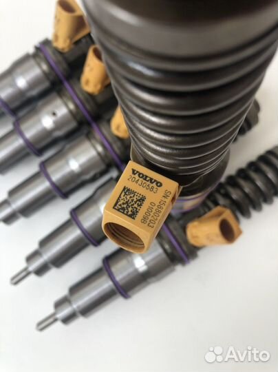 Насос форсунки volvo d12 20430583