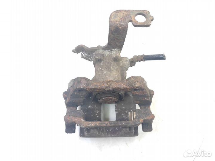 Суппорт тормозной задний левый Toyota Avensis