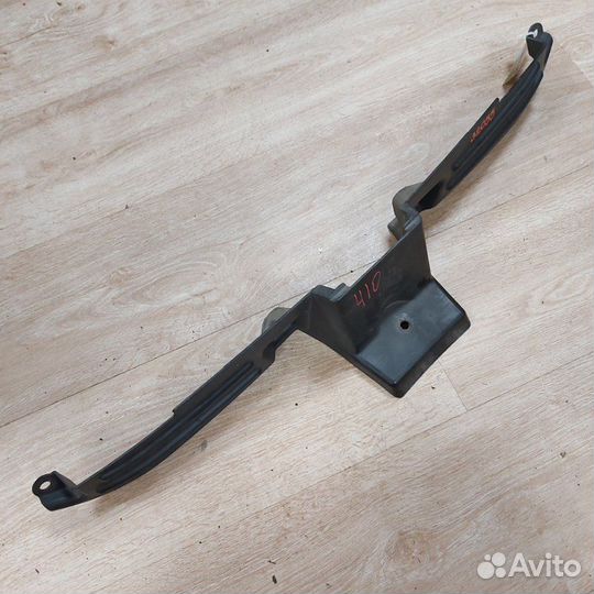 Кожух замка капота Mitsubishi Outlander Xl