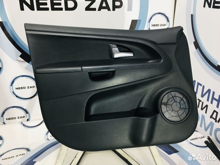 Обшивка передней левой двери Kia Venga