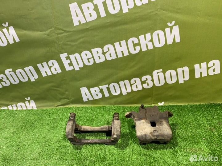 Суппорт тормозной передний правый Nissan Teana J31