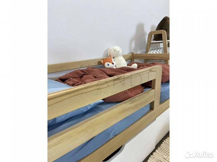 Детская кроватка с бортиком из бука