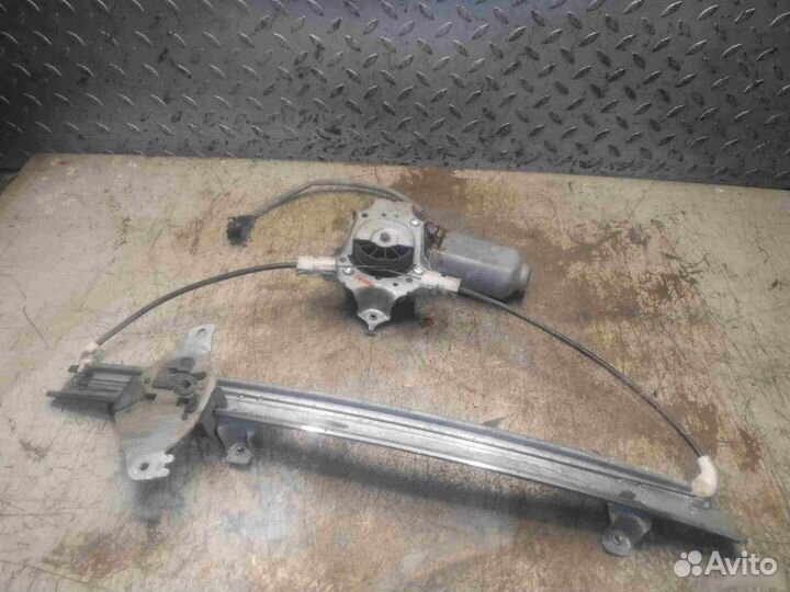 Стеклоподъемник эл. пер. левый Nissan Primera P11E