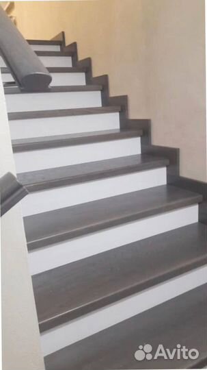 Обшивка лестниц на бетонном основании деревом