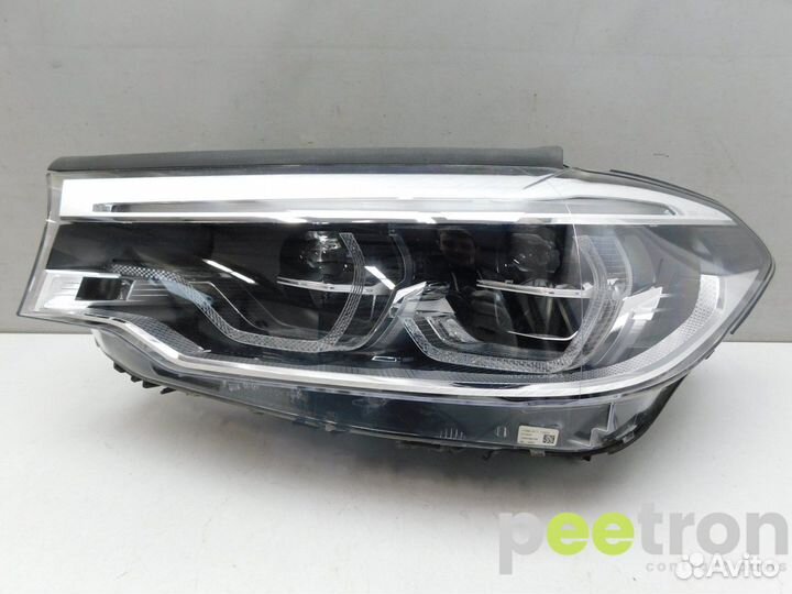 Б/У Б/У Фара левая б/у 63118499121 BMW