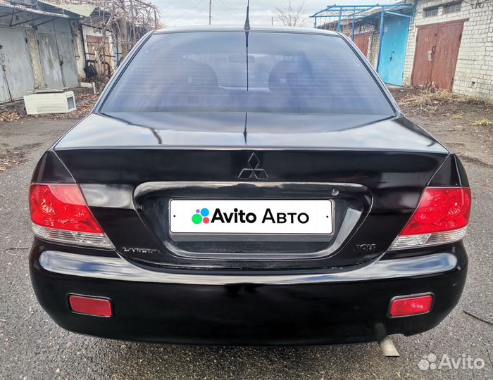 Mitsubishi Lancer 1.6 AT, 2005, 290 000 км