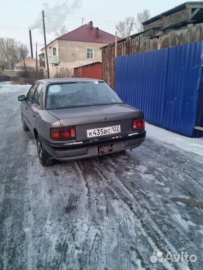 Mazda familia разбор