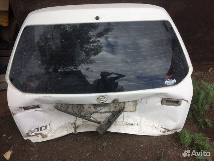 Стекло заднее Nissan Ad 1999-2008