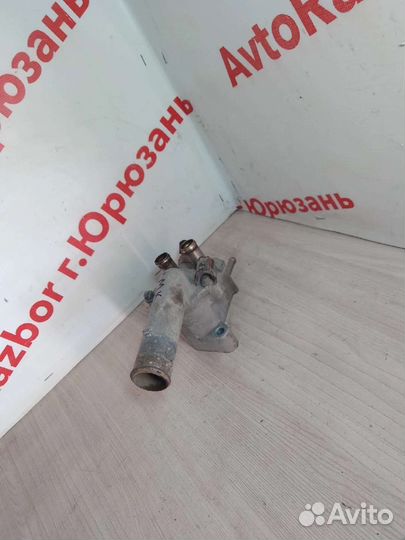 Корпус термостата Geely MK