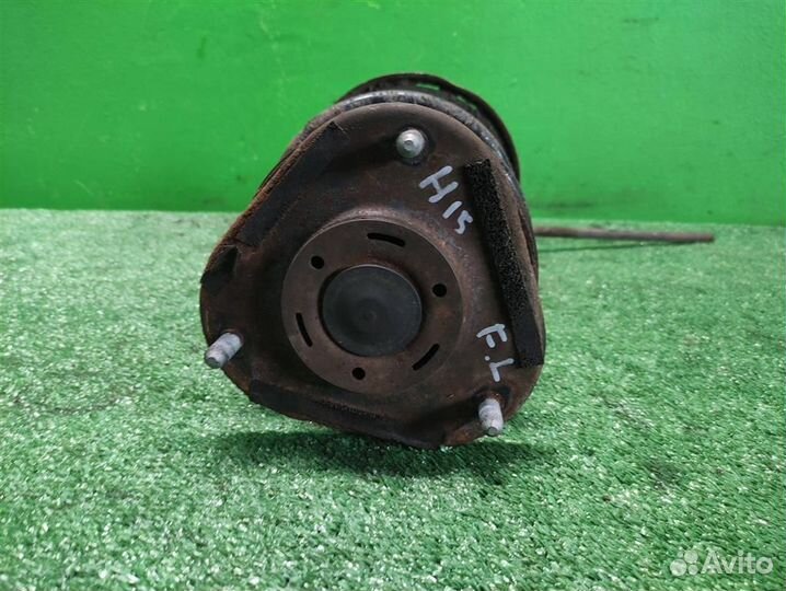 Стойка амортизатора передняя левая Toyota Auris E