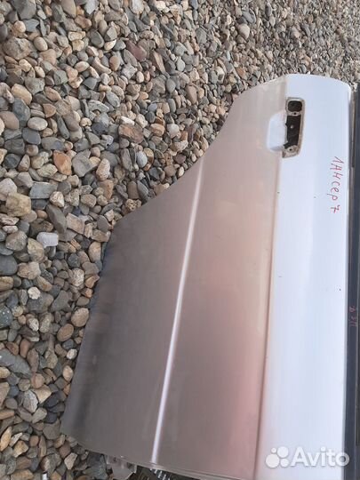 Задняя правая дверь на Mitsubishi Lancer VII,Лансе