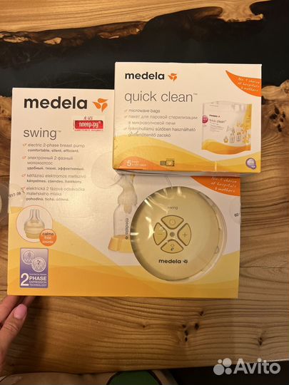 Электрический молокоотсос Midela