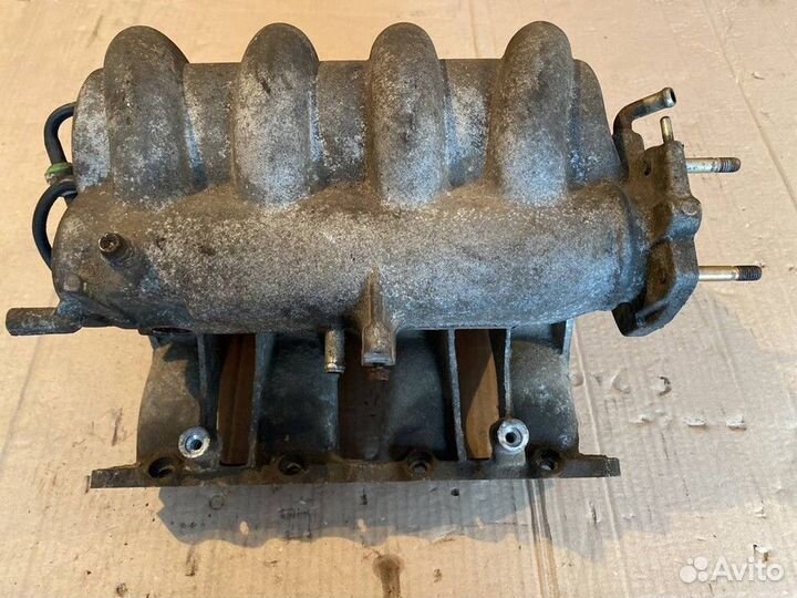 Коллектор впускной Mazda 323