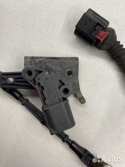 Датчик высоты подъема задний левый Volkswagen