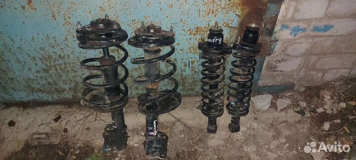 Стойки на mitsubishi lancer 9