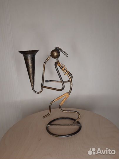 Продам подсвечник «Саксофонист»