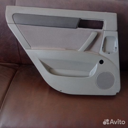 Обшивка двери задняя левая Chevrolet Lacetti