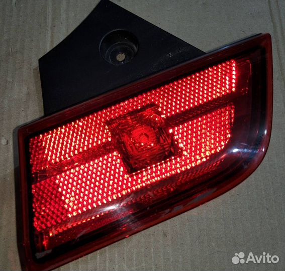 Фонарь задний в бампер левый Mitsubishi Pajero Spo