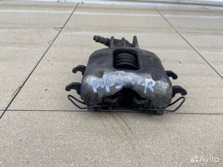 Тормозной суппорт передний правый Ford Focus 1