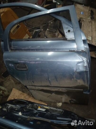 Дверь боковая задняя правая Opel Astra