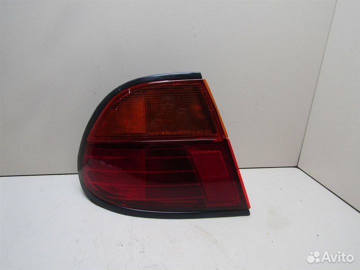 Фонарь задний наружный левый Nissan Almera N15 19