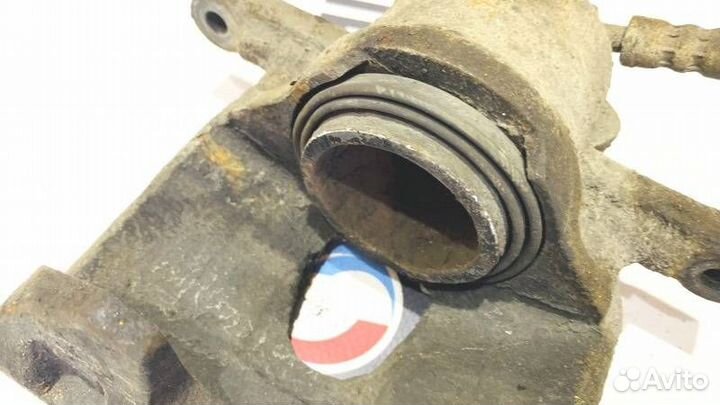 Суппорт передний левый Volkswagen Polo Sedan 5