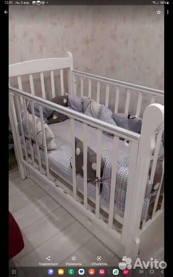 Детская кроватка с маятником и ящиком