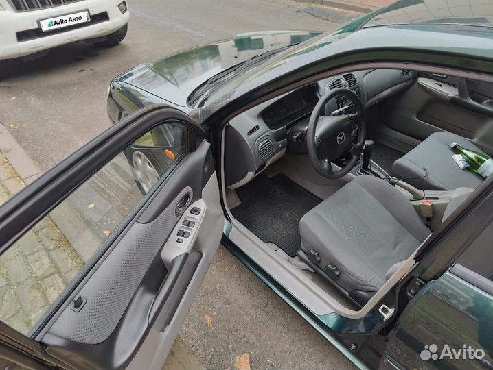 Mazda 323 1.6 AT, 2001, 235 000 км