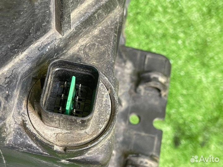 Фара галогеновая левая Kia Sportage KM G4GC 2009