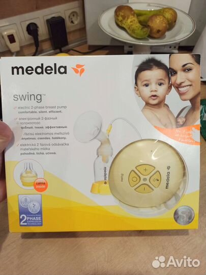 Молокоотсос medela электрический