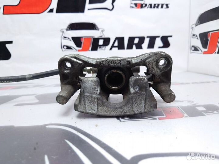 Суппорт задний правый Mitsubishi Lancer 10